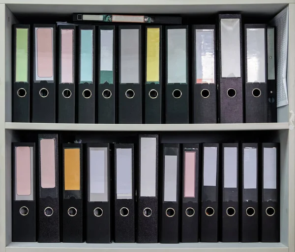 Closeup Black Plastic Folder Rowing White Shelf Collect Document Office — Stockfoto