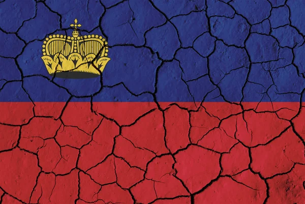 Fahne von Liechtenstein über rissigem Hintergrund — Stockfoto