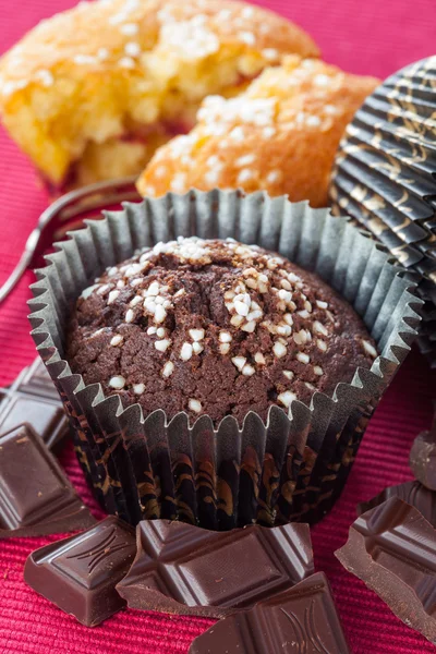 Chocolate muffins, vertical — Stock Photo, Image