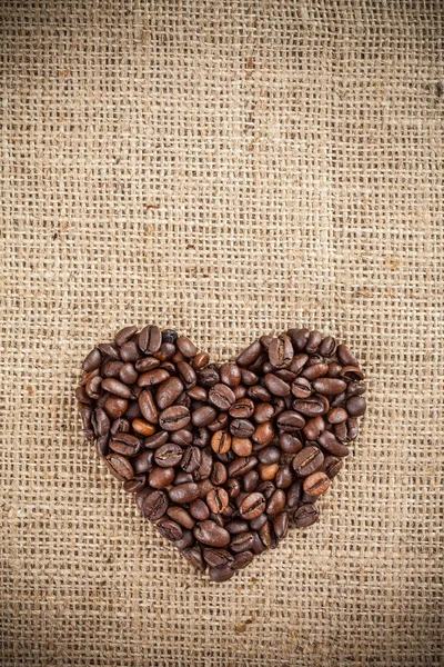 Heart shape made with coffee — Stock Photo, Image