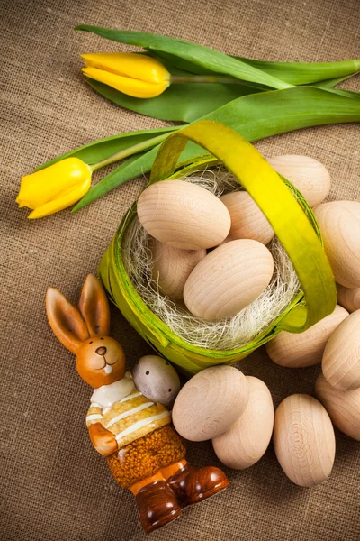 Easter decoration with rabbit, eggs and tulip — Stock Photo, Image