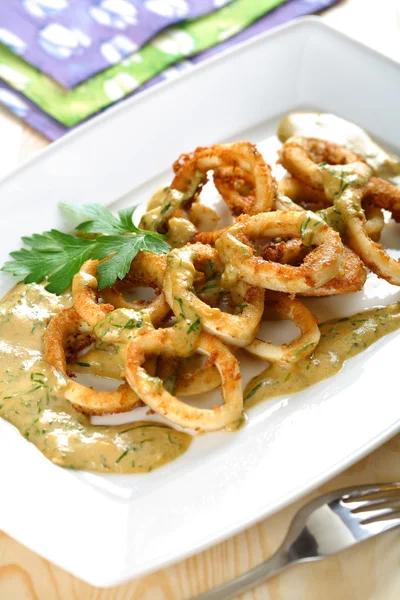 Squids in vinegar dressing and fresh herbs — Stock Photo, Image