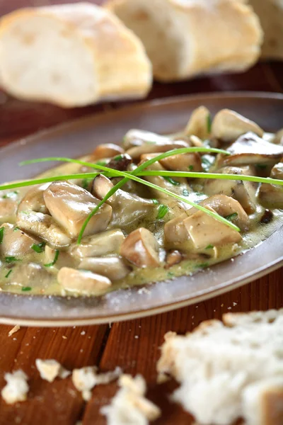 Mushrooms with lemon cream sauce, vertical — Stock Photo, Image