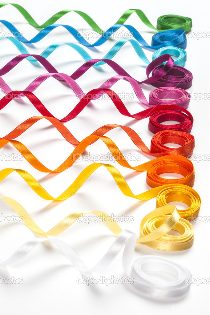 Abstract picture of colored sewing ribbons, on white background