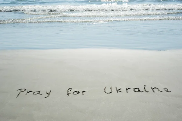 Concept Conceptual Pray Ukraine Handwritten Text Sand Beach Waves Exotic — Stock fotografie
