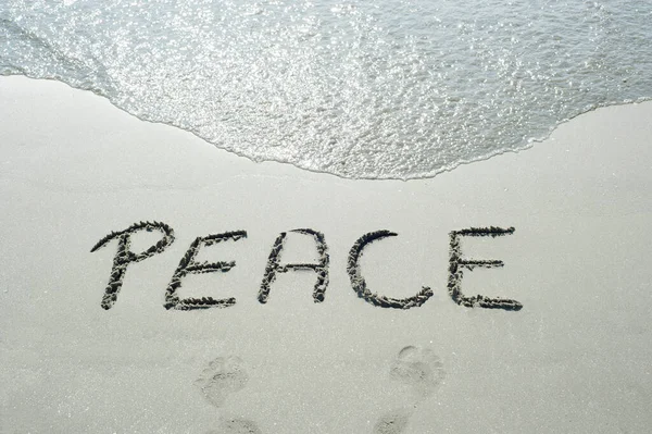 Concept Conceptual Peace Text Handwritten Sand Beach Waves Exotic Island — Zdjęcie stockowe