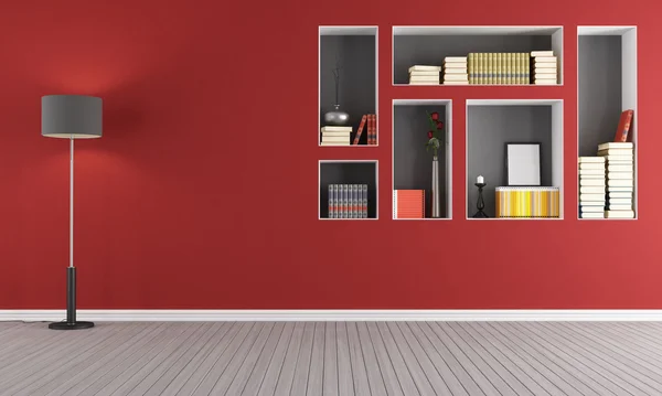 Soggiorno vuoto rosso con libreria — Foto Stock