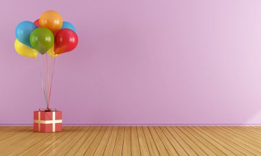 boş bir pembe odada renkli balonlar