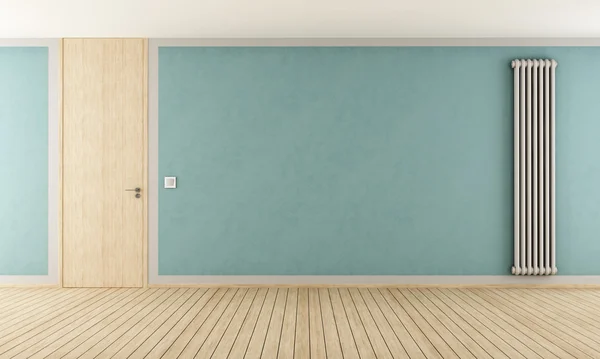Blaues Zimmer mit modernem Heizkörper — Stockfoto