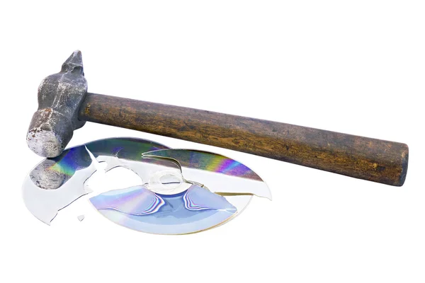 Broken into pieces cd disk and hammer — Stock Photo, Image