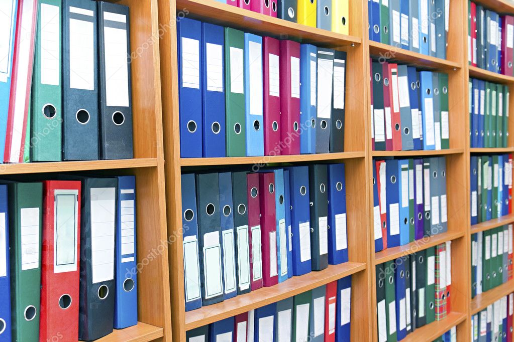 File folders, standing on the shelves