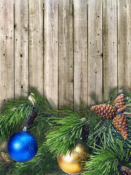 Christmas pine twigs with colored balls — Stock Photo, Image