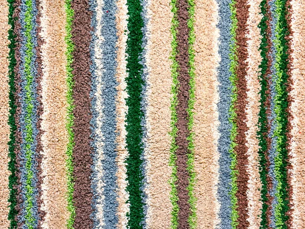 Фон грубої махрової тканини з барвистими смужками — стокове фото