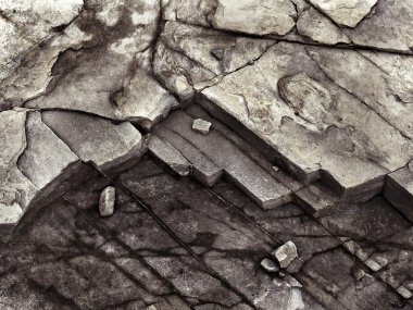 cracked stone rock in the style of grunge clipart