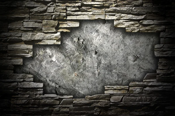 Pared de piedra con un gran agujero en el centro — Foto de Stock