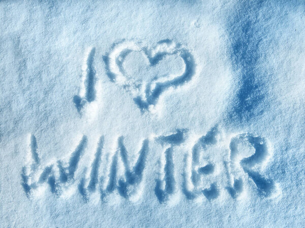 The inscription on the snow "I love winter"