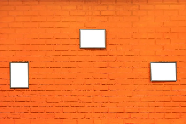 Orange Backsteinwand Mit Grauen Bilderrahmen Als Hintergrund — Stockfoto