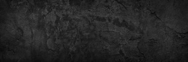 Arka plan olarak koyu gri, sert beton alçı. Panorama  