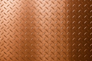 Elmas kabartmalı bakır metal, soyut arkaplan olarak bronz doku.