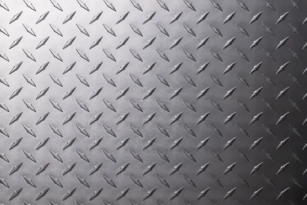 stock image diamond metal texture. reflective steel plate as background.