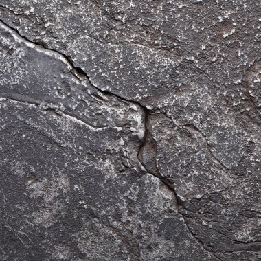 Çatlaklar ve çiziklerle yıpranmış metal doku. hasarlı çelik arkaplan