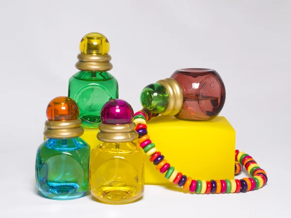 Multicolored bottles of toilet water — Stock Photo, Image