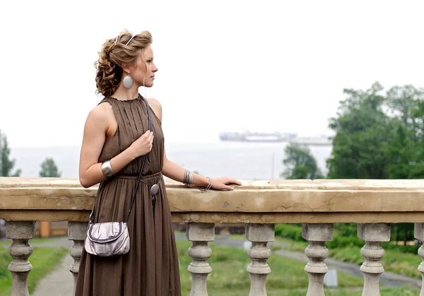 Beautiful girl on the balcony — Stock Photo, Image