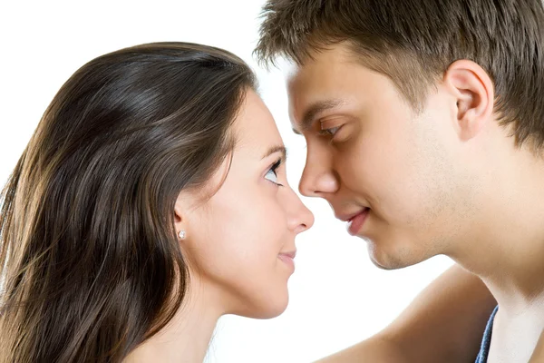 Young man and woman looking for tenderness and closeness — Stock Photo, Image