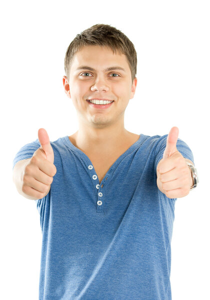 Handsome young man with thumbs up on an isolated white background