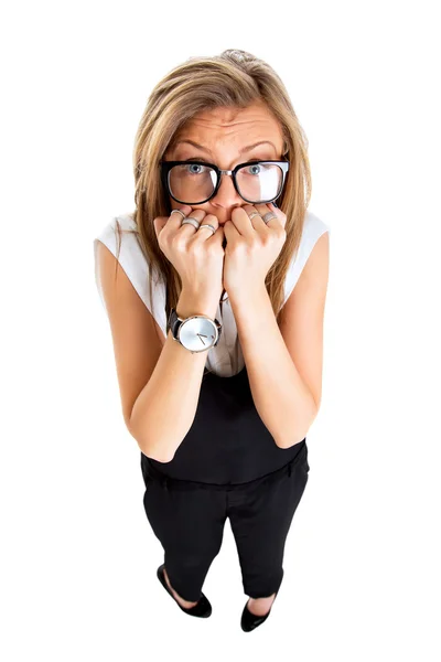 Frightened and stressed young business woman biting her fingers, — Stock Photo, Image