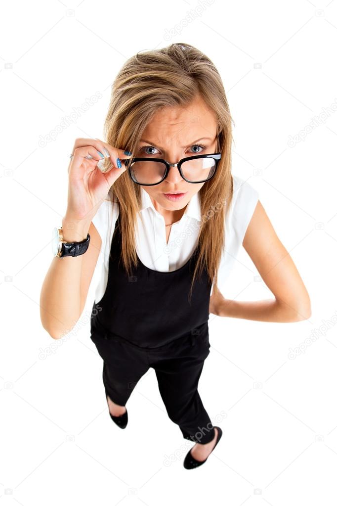 Suspicious upset angry and funny secretary taking off her glasse