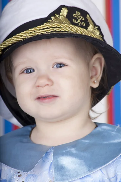 Little girl in a sea cap — Stock Photo, Image