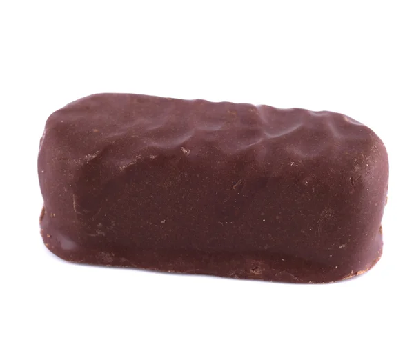 Caramelo de chocolate sobre un fondo blanco —  Fotos de Stock