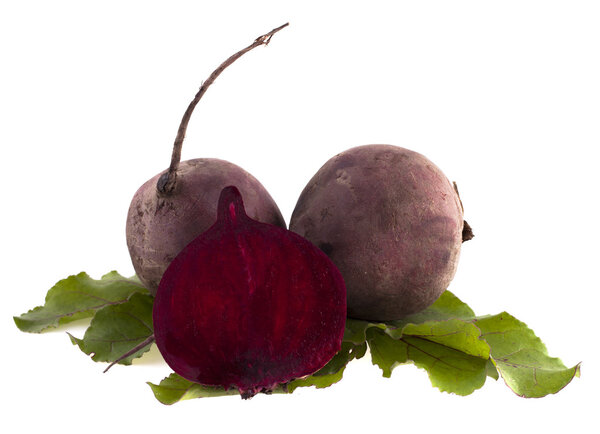Fresh beets with leaves isolated on white background