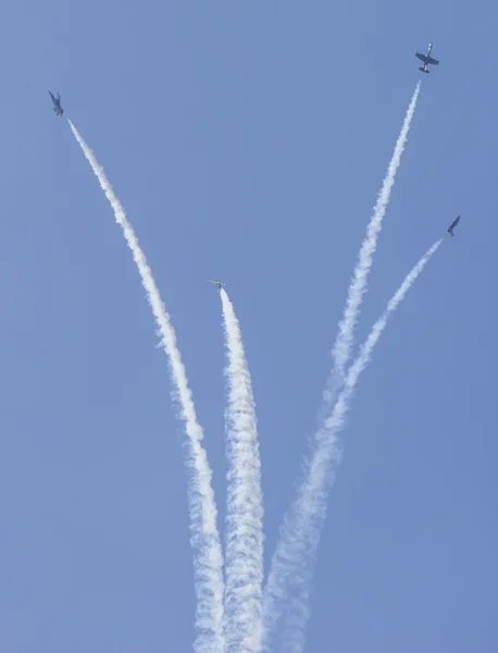 Aerobatic group "Rus" in the sky at an air show in the framework of the International Maritime Defense Show IMDS-2013, St. Petersburg — Stock Photo, Image