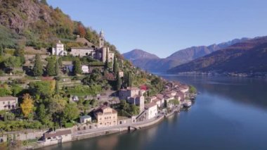 Lugano Gölü kıyısında bir İsviçre Belediyesi kurun.