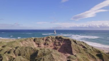 Rattray Head ve Kuzey Doğu İskoç sahil şeridindeki deniz feneri.