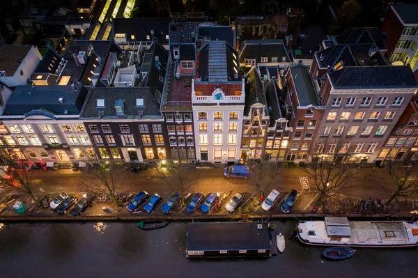 Huizen Aan Oevers Van Amsterdamse Grachten Nachts — Stockfoto