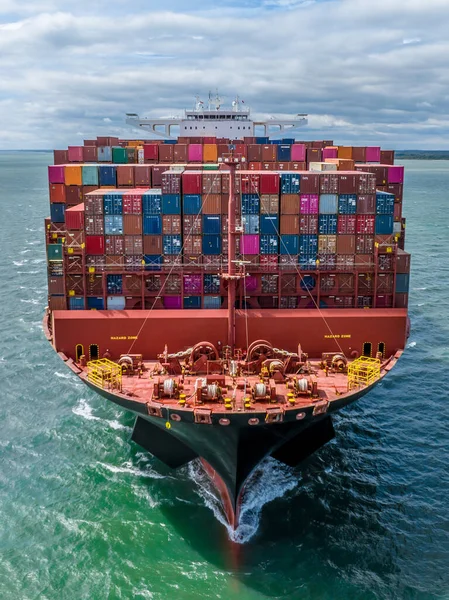 Bow of a Huge Container Ship at Sea Transporting Goods and Cargo