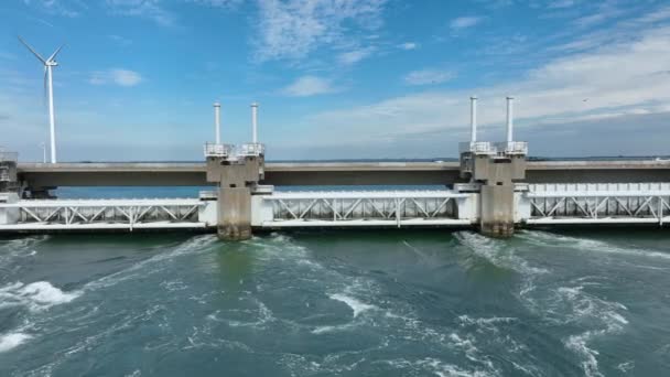 Sea Water Rushing Storm Surge Barrier Protecting Mainland — Stock Video