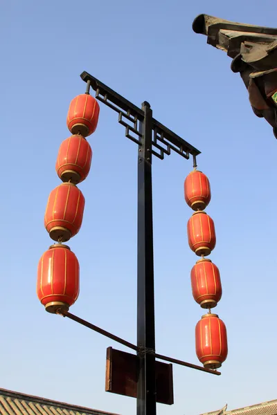 Red lantern on the eaves in a temple — Stock Photo, Image