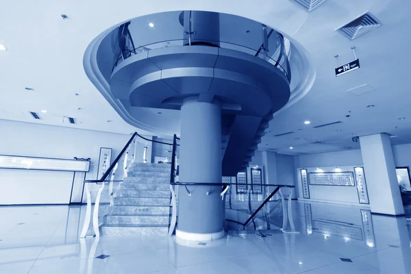 City indoor glass rotary stairs — Stock Photo, Image