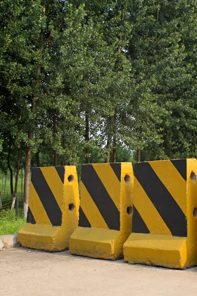 Chromatic cement traffic isolation pier — Stock Photo, Image