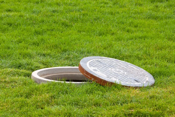 Water crossings under the lawn in a park — Stock Photo, Image