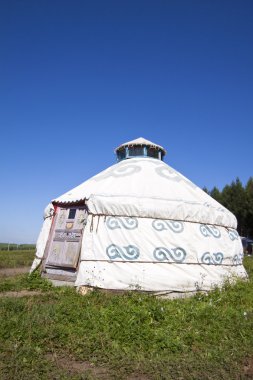 yurt house in grassland of China clipart