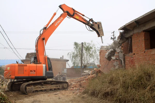 Trekkers trekken van het slechte huis — Stockfoto