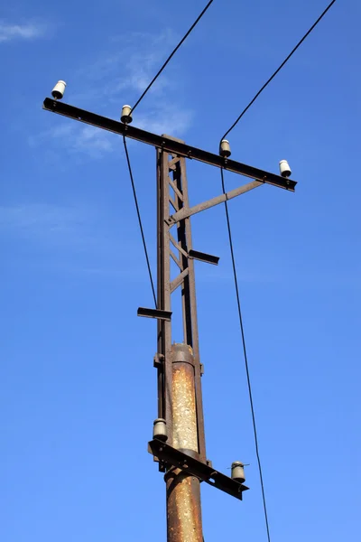 Poste de teléfono en el cielo azul —  Fotos de Stock