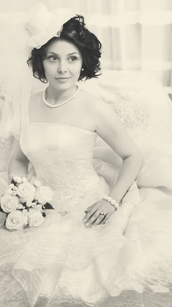 Retro sepia portrait of young brunette bride — Stock Photo, Image