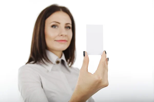 Beautiful business woman holding a blank card in her hand. — Stock Photo, Image