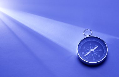 Compass in a beam of light